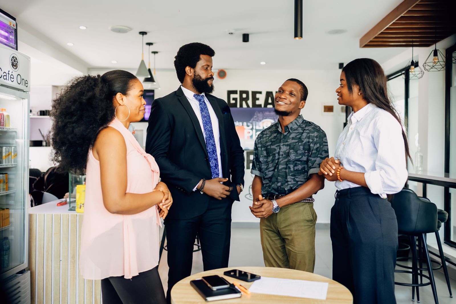 A hiring team in discussion during a meeting